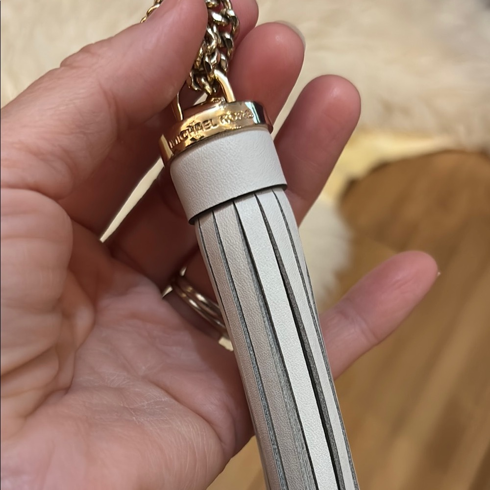 Michael Kors Cream Leather Tassel with Gold Accents